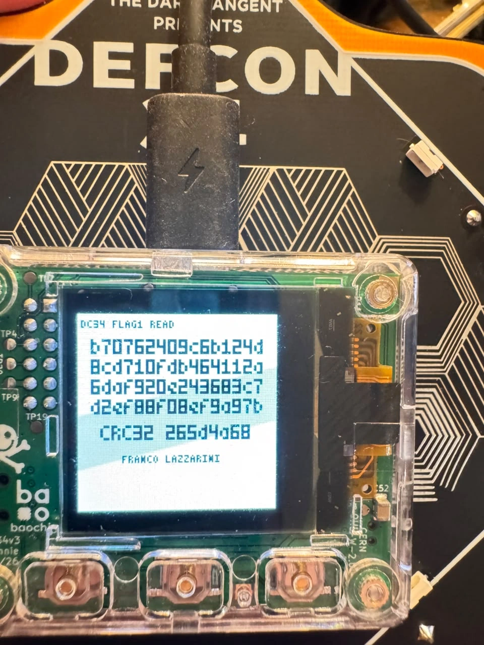 Validated physical result of Flag 1 on the badge screen